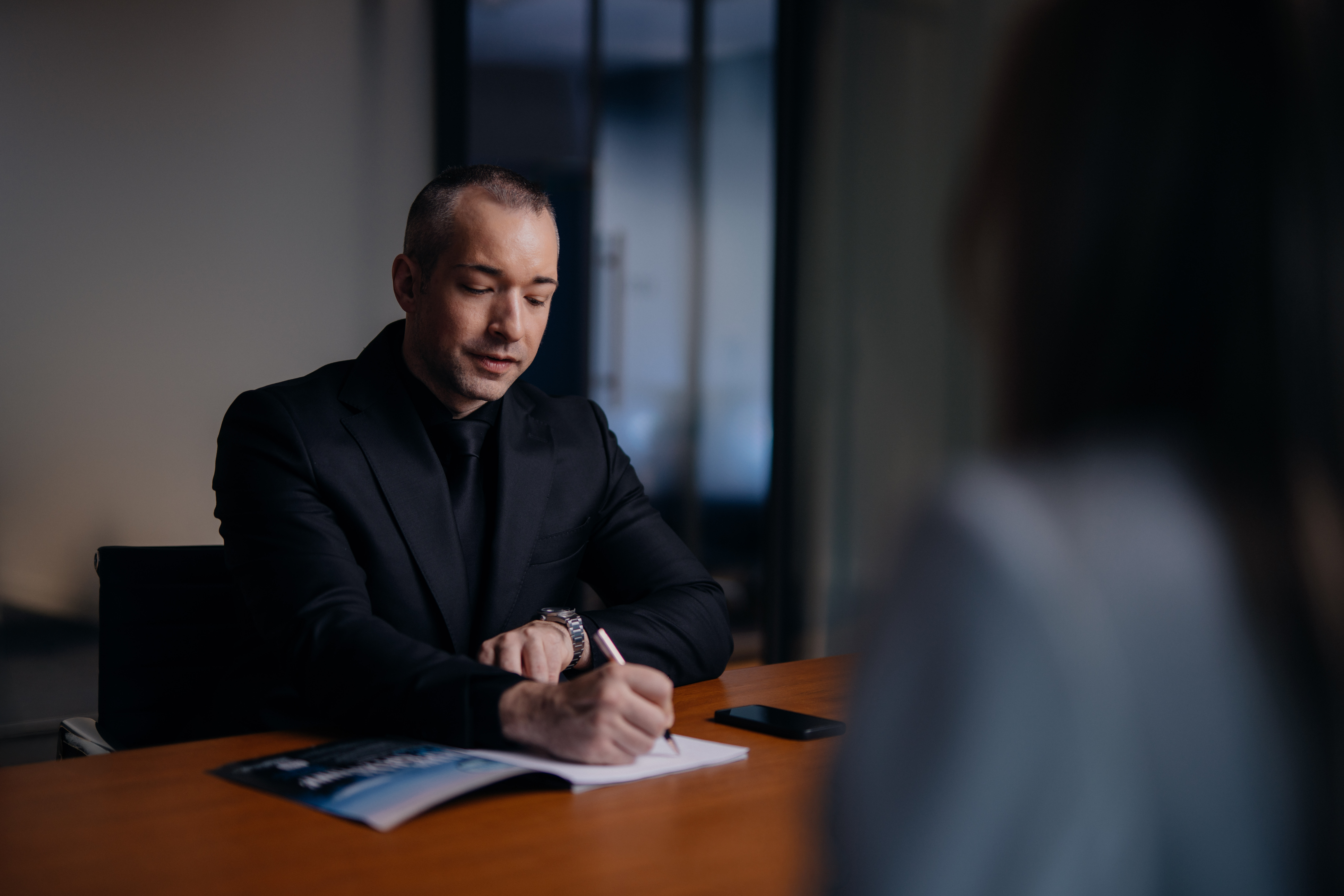 professionals comparing tax documents